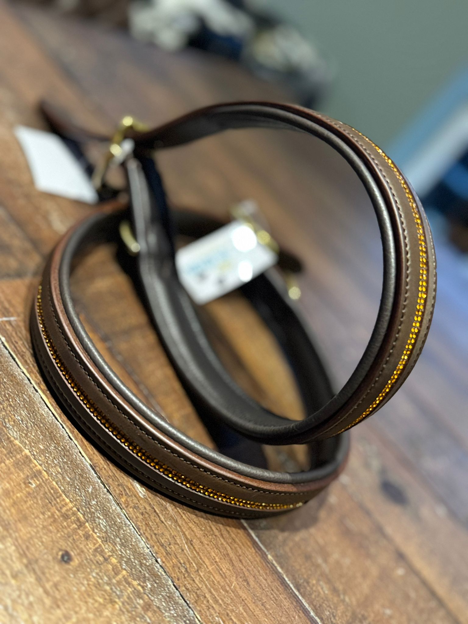 A brown leather figure of 8 head collar, embellished with handcrafted gold rhinestones