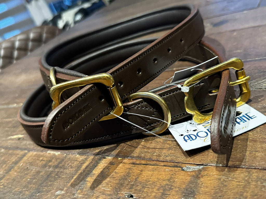 A brown leather figure of 8 head collar, with a gold buckle